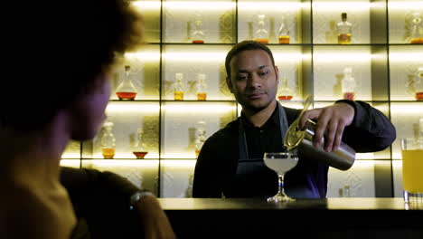 bartender serving a cocktail