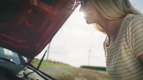 video of helpless woman lifts the hood of the car