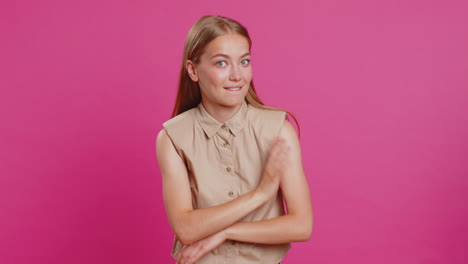 young woman presses finger to lips makes silence gesture sign do not tells secret stop gossip