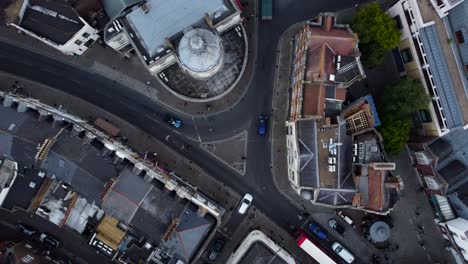 Birds-eye-view-drone-shot-cars-driving-on-road-in-London-in-England