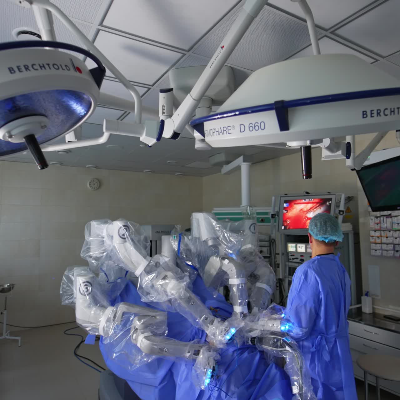 Technologically equipped surgery room in contemporary clinics. Operation with the help of robotic system is held in the room