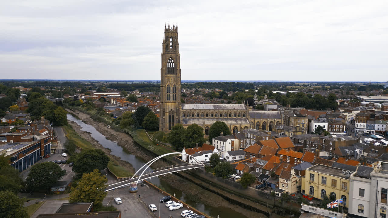 scenic beauty of Boston, Lincolnshire, in mesmerizing aerial drone footage: Port, ships, Saint Botolph Church , Saint Botolph's Bridge
