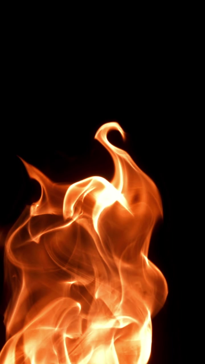 Dynamic Orange and Yellow Fire Flames on Black Background
