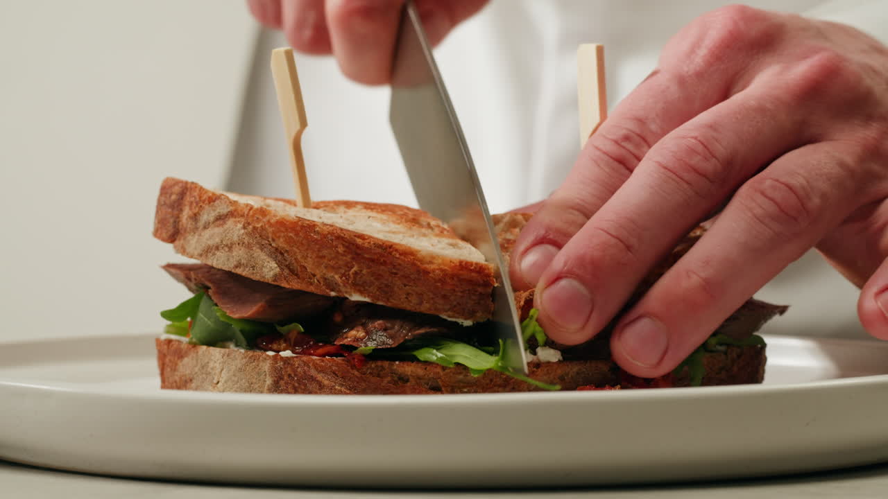 Chef preparing a delicious sandwich