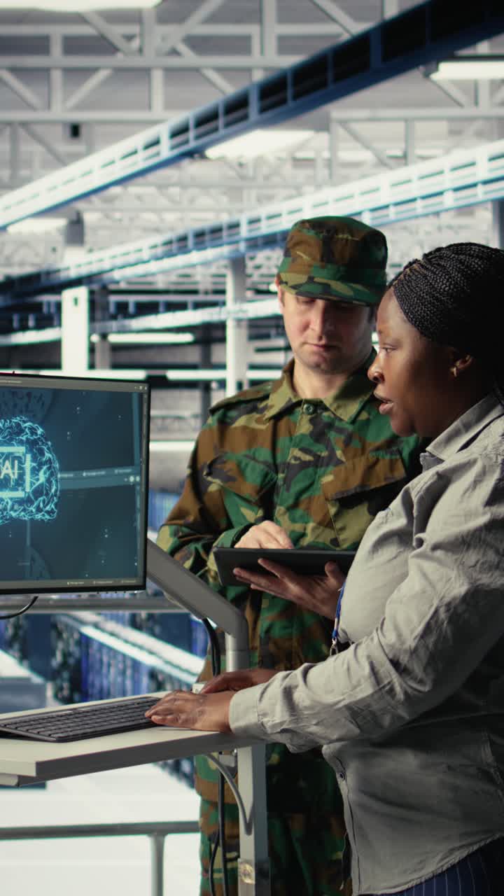 Vertical Video Army Specialists In Server Room Use Advanced Ai Tools To Review Information