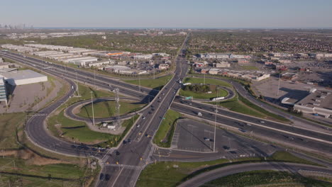 Mississauga highway 401, showcasing roads, traffic, and cityscape, aerial view