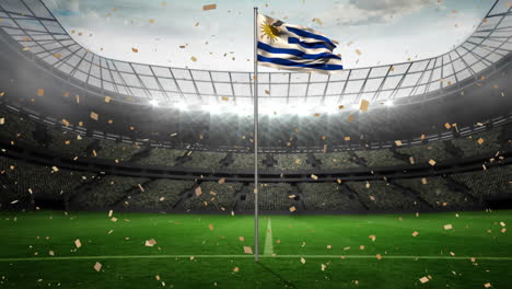 uruguayan flag waves proudly in a stadium, celebrating a momentous event