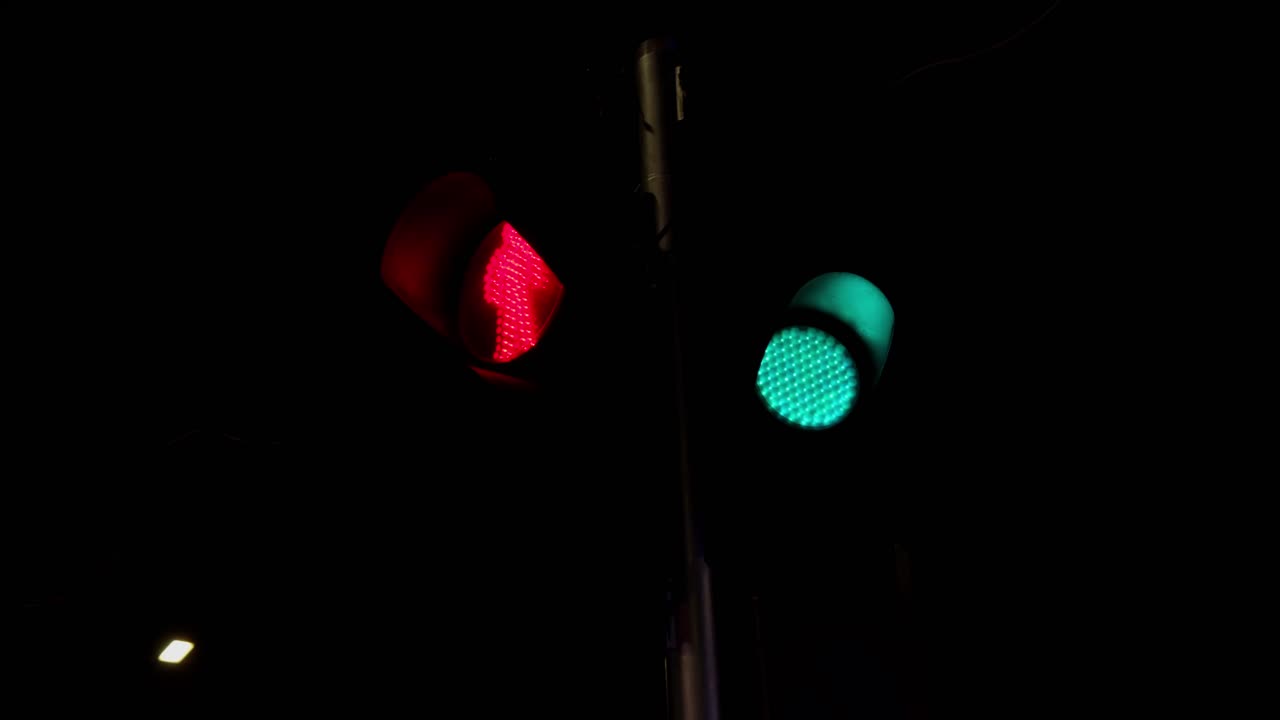Traffic city light signal pedestrian and vehicle at intersection, night-time