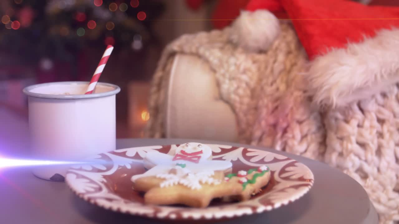 At start camera panning right across mantel, centering on cookies and mug to showcase holiday snack