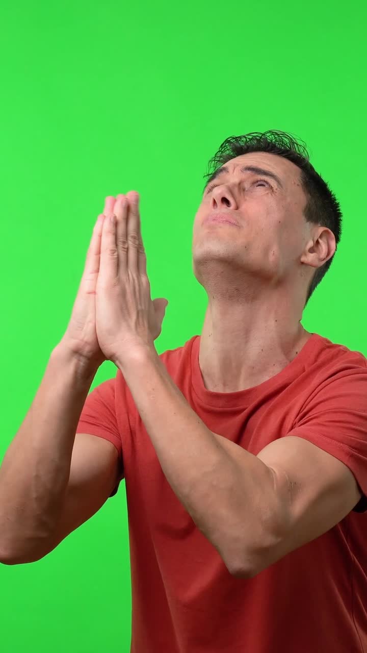 Man Praying on Green Screen