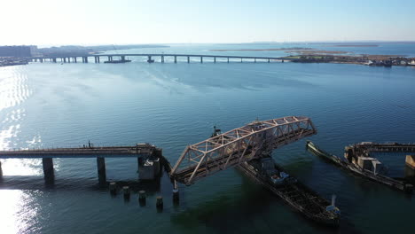 an aerial drone shot over grassy bay in queens, ny