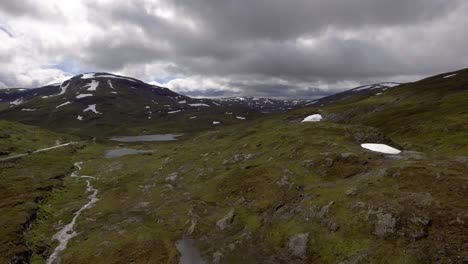 aerial of a mountain pass in norway