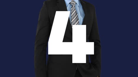numbers in animation over person in business suit on dark background
