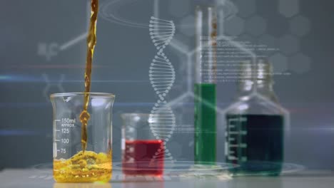 animación de la cadena de adn y procesamiento de datos sobre vasos con líquido
