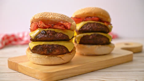 hamburger-or-beef-burgers-with-cheese,-bacon-and-french-fries---unhealthy-food-style