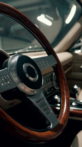 vintage car interior with wooden steering wheel and leather seats