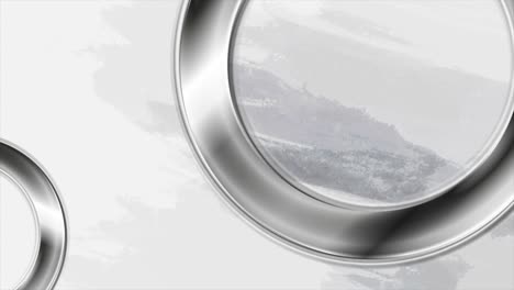 silver circles on watercolor grunge abstract background motion design