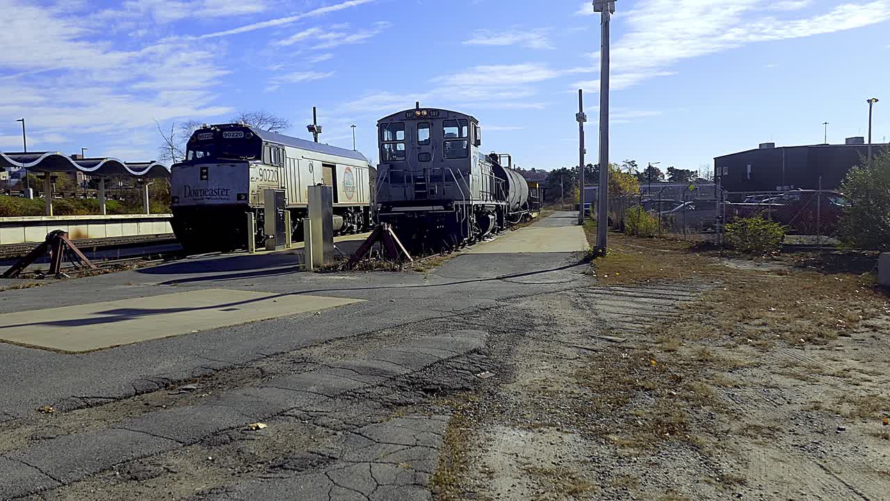 Two locomotives at a train station