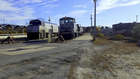 Two locomotives at a train station
