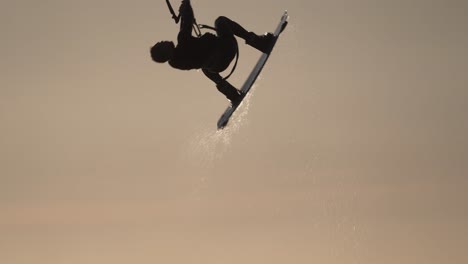 kiteboarding silhouette at sunset