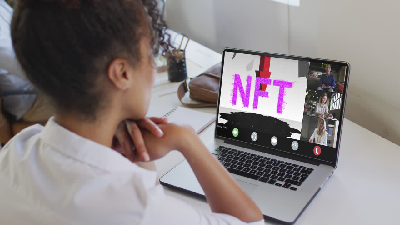 Video of biracial woman having nft video call with coworkers