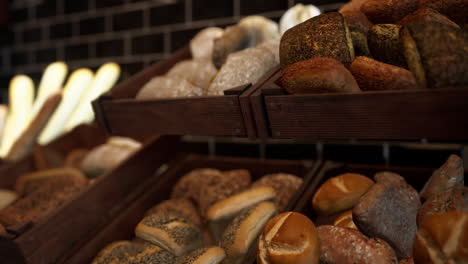 assorted doughnuts displayed on shelf