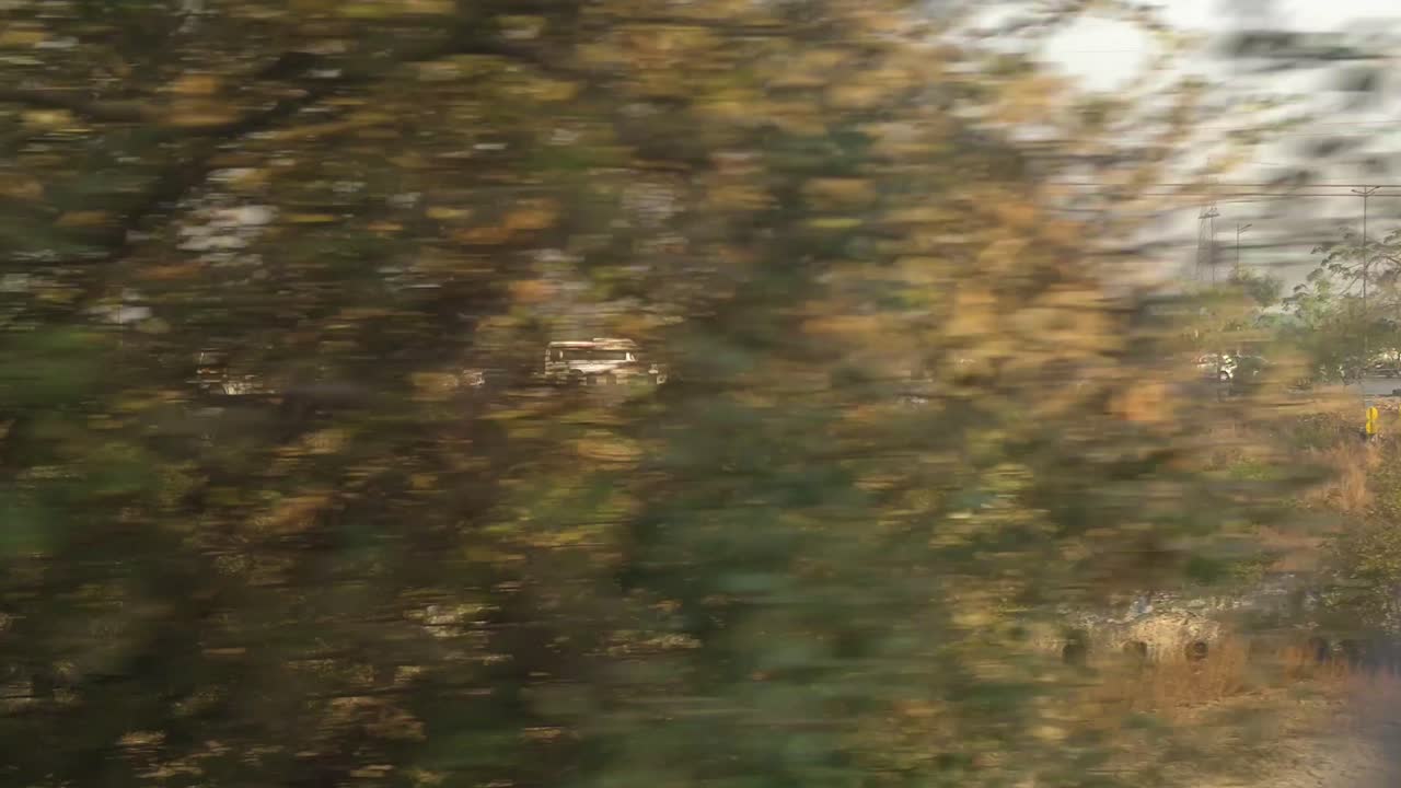 Indian Highway shot following mini bus stock video I Indian mini bus on highway cinematic stock video in 4K