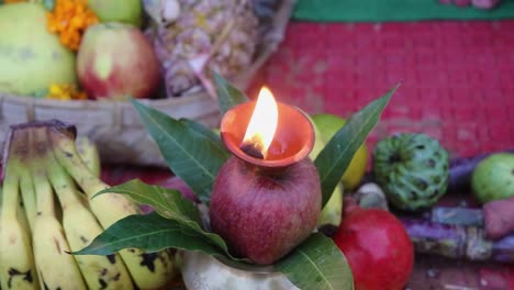 burning oil lamp with offerings during holy rituals at festival from different angle video is taken on the occasions of chhath festival which is used to celebrate in north india on oct 28 2022