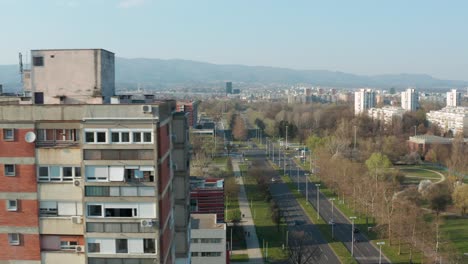 Aerial-truck-shot-flying-through-high-rise-apartment-buildings-in-Zagreb,-Croatia