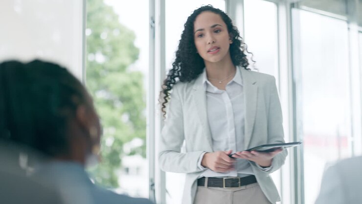 Business, coaching and woman at workshop