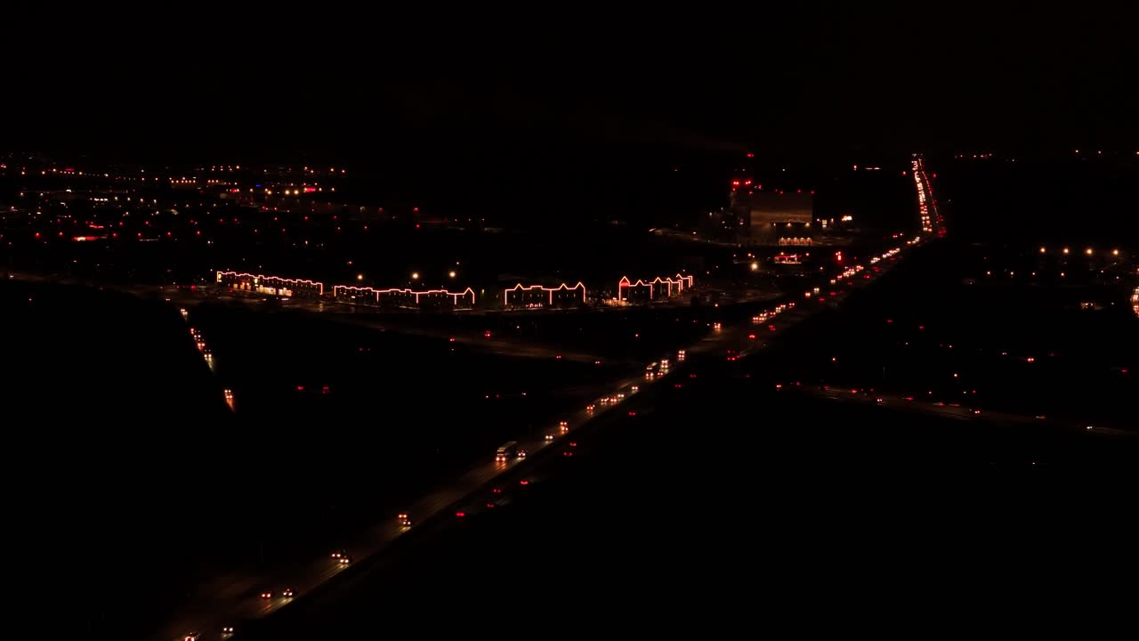 Highway traffic in Kaunas city at night. Aerial view