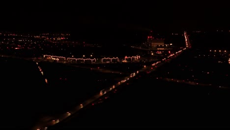 highway traffic in kaunas city at night. aerial view
