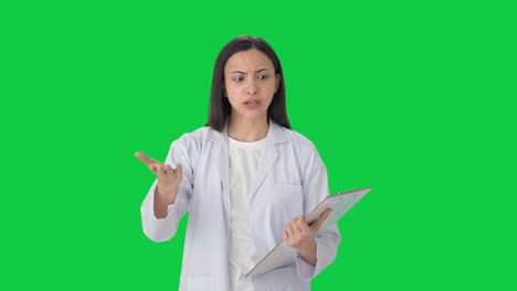 Angry-Indian-female-scientist-shouting-on-someone-Green-screen