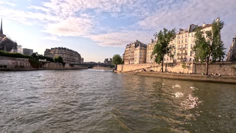 boat ride on the seine river, passing through the city on a peaceful day