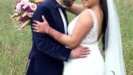 shot-of-bride---groom-with-wedding-flower