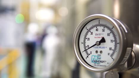 industrial pressure gauge in a manufacturing facility