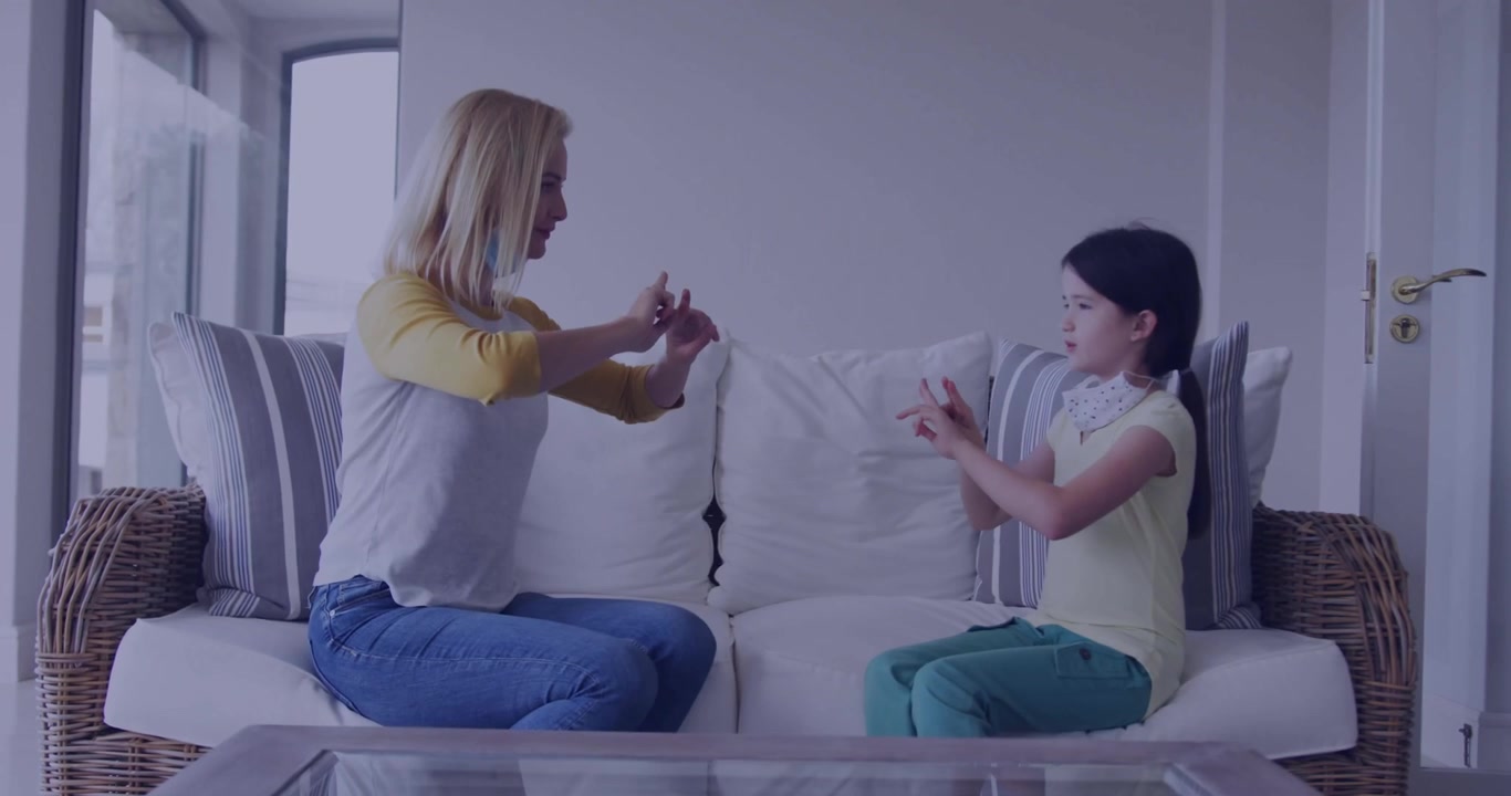 Mom and daughter playing finger game causing social media subscribe overlays appearing disappearing