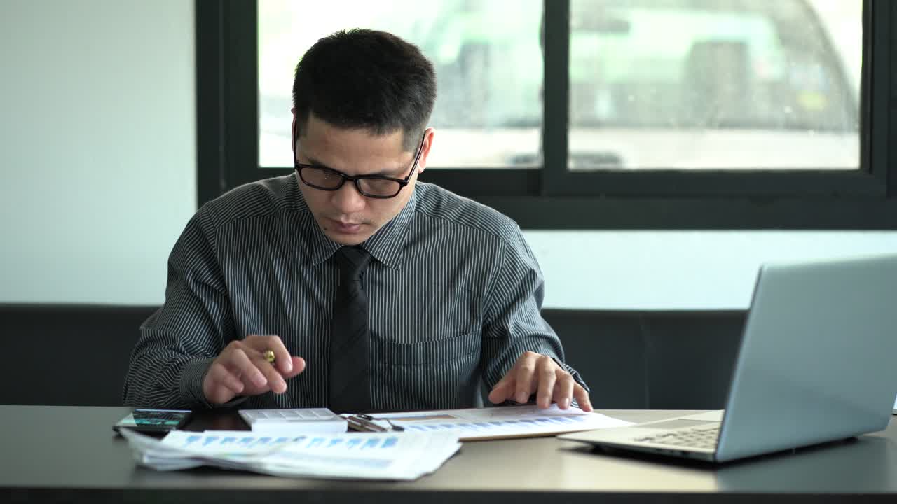 Calculations with business documents Policy and plan analysts are analyzing data from graphs to improve performance. business concept and education