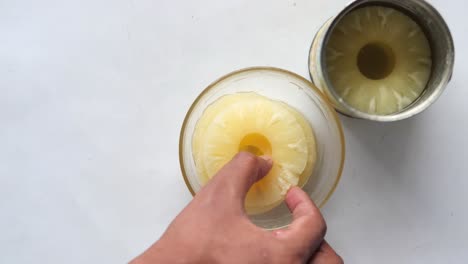 canned pineapple rings in glass bowl