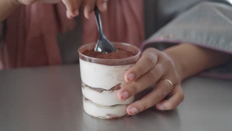 woman eating dessert