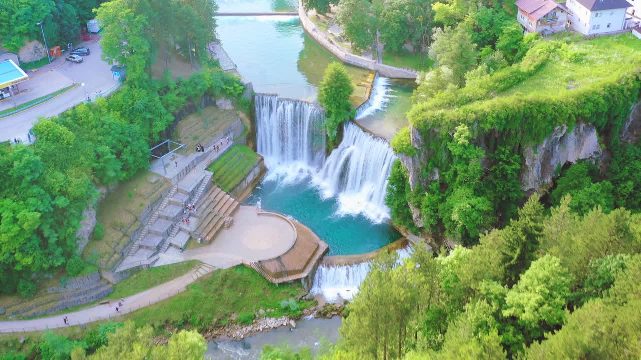 Tourists View Provalije Waterfall Near Small Town Of Osanjici, Bosnia and Herzegovina