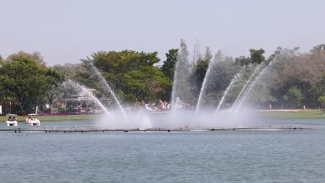 fountain show in a scenic park setting