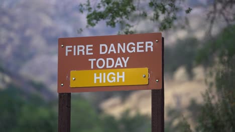 High-Wildfire-Danger-Warning-Sign-in-California,-Close-up