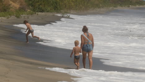 happy family of mother with kid playing