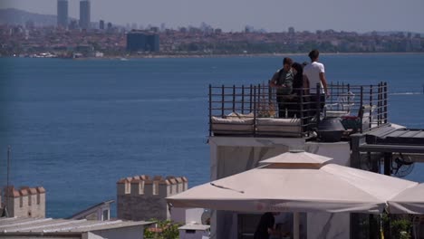 young people having fun on a seaside terrace