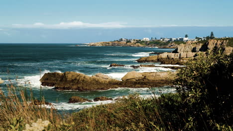 natural beauty of hermanus rocky coastline, windy seascape view from cliff path