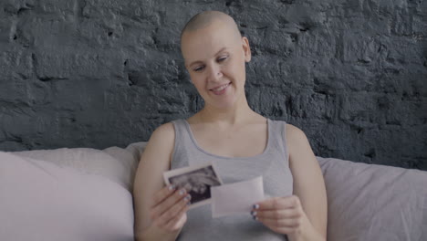 happy pregnant woman viewing ultrasound