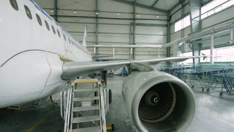 airplane maintenance in a hangar