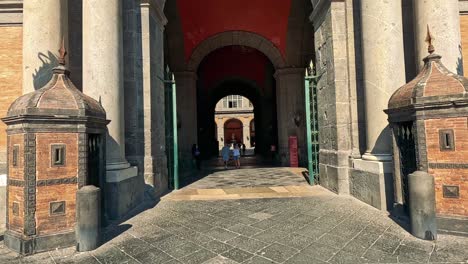 visitors explore iconic architecture in naples, italy