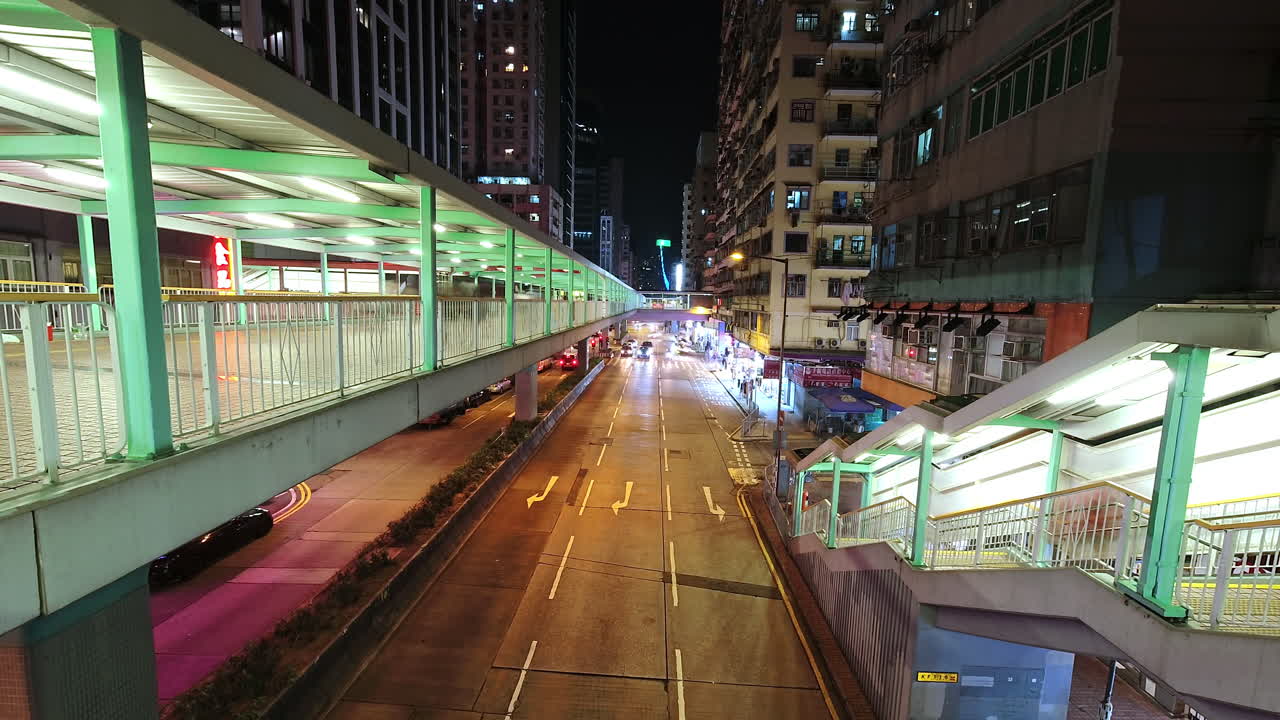 Night Timelapse of Mong Kok busy traffic on the Road, Hong Kong